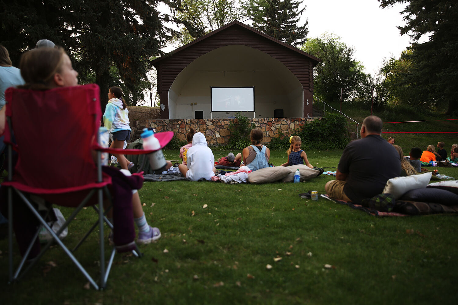 Everyone spread out on the grass as the movie was clicked on